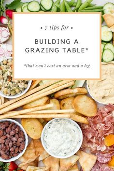 a platter filled with different types of food and the words tips for building a grazing table that won't cost an arm and leg