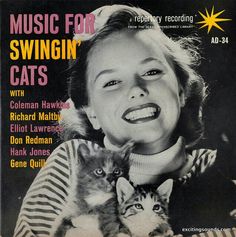 a woman holding two kittens on top of a magazine cover with music for swingin'cats