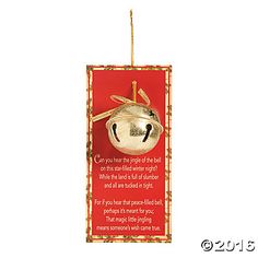 a christmas ornament hanging on a string with a poem in the middle and an image of a bell