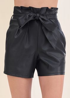 Embrace the edgy vibe of faux leather in these curve-skimming belted shorts! The flattering paperbag waist with its sash tie belt is made for tucking in a smooth top that spotlights your shape. Complete with in-demand side pockets, these shorts are a must-have addition to your wardrobe. * Sash tie belt included * High- Leather Trend, Statement Skirt, Swim Trends, Fall Denim, Denim Sweater, Belted Shorts, Plus Size Shopping, Plus Size Skirts, One Piece Suit