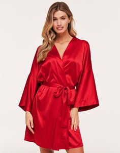 The Izabella kimono robe is perfect for a romantic night in. With a satin feel and self-tie closure, this sleepwear is both comfortable and stylish. (Available in sizes XS-XL.) Red Silk Robe, Robe For Bride, Sadies Dress, Red Kimono, Day To Night Dresses, Silk Cami, Silk Robe, Silk Shorts, Silk Wrap