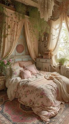 an old fashioned bedroom is decorated in pink and green tones with curtains, bed linens, and flowers on the ceiling