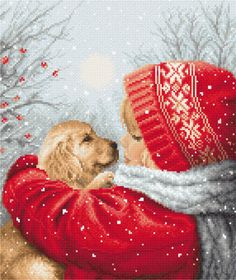 a cross stitch pattern of a dog hugging a woman in the snow with her red sweater and hat on