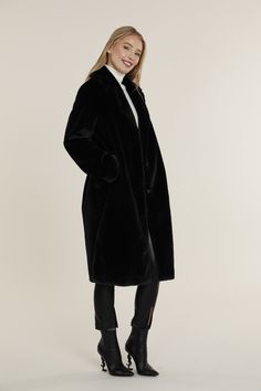 Looking for the perfect long black faux fur coat to complete your cold-weather outfits? Elevate your fall and winter looks with our luxurious Long Faux Fur Coat⁠—which also comes in Pale Grey. Beautifully plush and warm, this full-length faux fur coat is the epitome of comfort and elegance. It’s the ultimate outerwear for keeping you comfortable in chilly weather. Faux fur Full length Button up closure Comes in Black and Pale Grey Dry clean Item # 75381 Final Sale Item Black Faux Fur Coat Outfits, Black Fur Coat Outfit, Fur Coat Outfit Casual, Night Life City, Fur Coat Outfits, Faux Fur Coats Outfit, Fur Coat Outfit, Black Fur Coat, Womens Faux Fur Coat