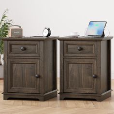 two wooden nightstands side by side with a laptop on top