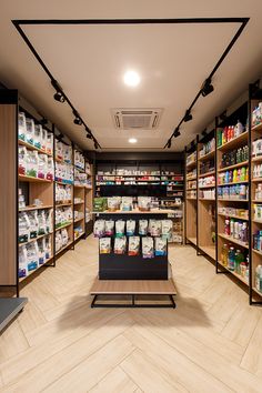 a store filled with lots of different types of food and drinks on shelves next to each other