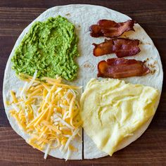 a tortilla with bacon, cheese and guacamole