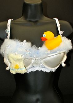 a bra with a rubber ducky in it