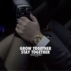 a person in a car with their hand on the steering wheel and text that reads, grow together stay together @ success