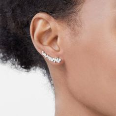 Inspired by nature's first blooms, ethical diamonds huddle together, reminiscent of flower petals blossoming up the ear. Cast with high-end recycled gold, the minimalist shared prongs leave the focus on the brilliant diamonds. Accent diamonds: 1.00+ ctw, VS2+/F+ Backing: Shepherd hook backs Ethical Diamonds, Crawler Earrings, Ear Crawler Earrings, Jewelry Designing, Ear Party, Crawlers Earrings, Types Of Diamonds, Earrings Diamond, Precious Gems