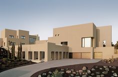 a modern house is shown in the desert