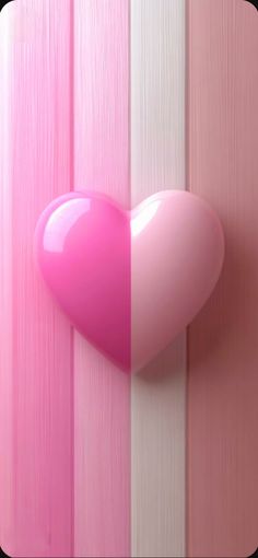 a heart shaped object on the side of a pink and white striped wooden paneled wall