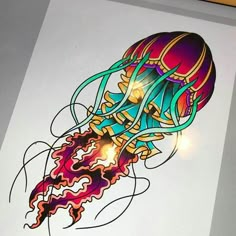 a drawing of a jellyfish on a piece of white paper with colored inks