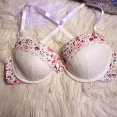 Very Sexy Laura Ashley Ultra Padded Push Up Bra. Beautiful Lace Design Covering 3/4 Of The Cup And A Sexy Pretty Pink And White Floral Pattern Going Up The Top Of The Cup. It's A Beautiful Design Tith The Lace Back Strap So The Straps Only Go Over The Shoulders, It's Fitted To Push Up And Squeeze Your Breasts Together To Show The Most Cleavage That I've Ever Seen A Bra Show It's Nwot And Is Sexy And Cute And You'll Feel Sexy And Your Man Will Wonder What You've Done Different, Because You'll Loo White Fitted Feminine Bra, White Feminine Bra With Lined Body, Feminine White Bra With Lined Body, White Stretch Push-up Bra, White Padded Bra For Spring, Feminine White Push-up Bra, Spring White Padded Bra, Feminine White Bra For Spring, White Push-up Bra For Summer