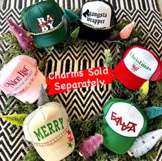 several hats are arranged in the shape of a wreath with merry words on them,