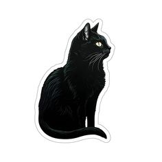 a black cat sticker sitting on top of a white surface with its eyes open