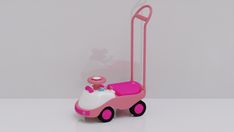 a pink and white toy car with wheels