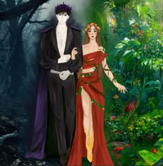 a man and woman dressed in costume standing next to each other on a forest floor