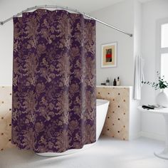 a purple shower curtain in a bathroom next to a bathtub and sink with a vase on the side