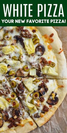 a white pizza sitting on top of a table