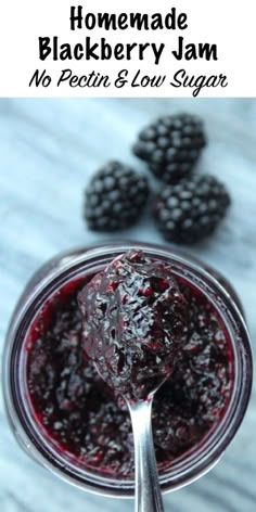 homemade blackberry jam in a jar with spoon