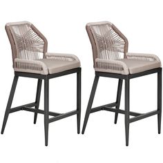 pair of wicker bar stools with beige cushions