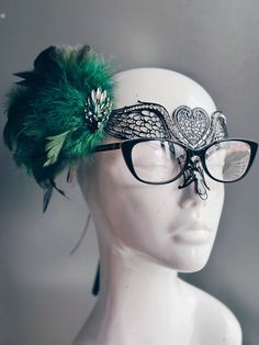 Made for eye glass wearers! Mask will fit around the frames of your eyeglasses comfortably.   Black Metal masquerade mask with lovely feather clip attached. More colors for the feathers are available. S H I P P I N G  -   Last minute masquerade mask shopping? Quick processing available.  For 1-2 day guaranteed delivery, add items to cart, click on shipping tab for rates on last page of checkout. Msg us for delivery time frames (Include your state/country). S I Z E  Adult Size. Detailed dimension Masquerade Mask Women, Black Masquerade Mask, Green Feathers, Thank You Wishes, Metal Mask, Feather Mask, Green Feather, Masquerade Masks, Laser Cut Metal