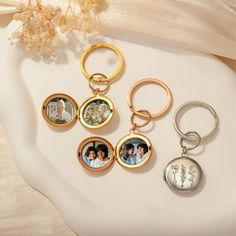 four different key chains with pictures on them