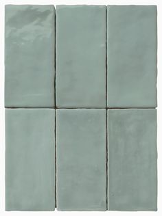 the square tiles are light blue with white trim