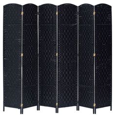 a black room divider with four panels