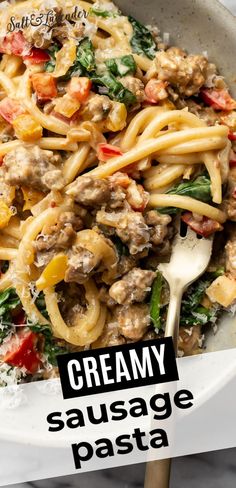 closeup of a bowl of bucatini with a fork and text overlay that reads creamy sausage pasta Peppers Pasta, Sausage And Peppers Pasta, Creamy Sausage Pasta, Italian Sausage Recipes, Sausage Dishes, Pepper Pasta, Sausage And Peppers, Pasta Dinners, Pasta Dinner Recipes