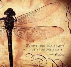 a dragonfly sitting on top of a pole with a quote written in the middle