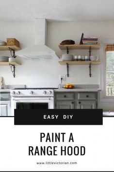 a kitchen with white walls and gray cabinets