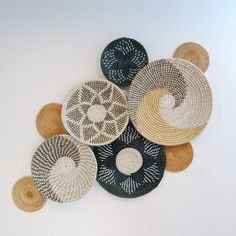 several woven baskets are arranged on the floor