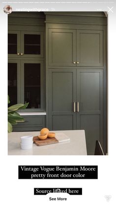 a kitchen with green painted cabinets and white counter tops, along with the words vintage vaque benjamin moore pretty front door color