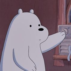 a polar bear standing in front of a mirror