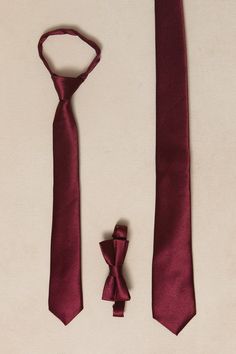 Say hello to our Mens Max Tie, now available in a luxurious wine satin fabric. Just in time for fall weddings. The self-tie style allows for a comfortable fit every time. Perfect for any occasion, this tie is sure to elevate your look. Burgundy Standard Tie For Black Tie Events, Elegant Fitted Bow Tie With Adjustable Ties, Elegant Formal Ties, Elegant Wedding Suit And Tie Accessories With Adjustable Ties, Fitted Burgundy Ties For Black Tie Events, Elegant Formal Bow Tie With Adjustable Ties, Classic Formal Suit Accessories With Adjustable Ties, Party Satin Finish Tie, Elegant Adjustable Ties For Black Tie Events