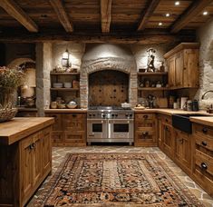 a large kitchen with wooden cabinets and an area rug