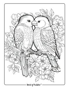 two birds sitting on top of each other in front of flowers and leaves with the words love