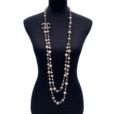 This is part of Chairish’s Costume Jewelry assortment.  Long Light Gold Metal Double Strand Chain Necklace By Chanel.   It Features Artificial Pearl Beads In Different Sizes And Cc Logo Embellished With Small Artficial Pearls.   Lobster Closure.   'Chanel - A11 Cc A- Made In France Oval Tab On The Closure.   Necklace'S Lenght: 44 Inches - 111.8 Cm Condition A - Excellent Gently Used.   Chanel Dustbag:Included.   Please, Look Carefully At The Photos And Ask For Any Detail.   Details Material: Met Chanel Necklace, Chanel Pearls, Long Light, Gold Models, Faux Pearl Necklace, Vintage Cartier Bracelet, Cc Logo, Chain Pendants, Pearl Beads