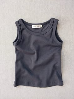 long and slim fitting sleeveless top with a high crew neck. adorable on girls or boys with skirts, bloomers, or shorts.all of our organic cotton products are made ethically in the usa from start to finish, from the cotton, through the custom low-impact dying and finally to the sewn garment.3m, 6m, 12m, 18m, 2/3, 4/5, 6 Cotton Tank Top, Dream Clothes, Pretty Outfits, Fashion Inspo Outfits, Cool Outfits, Sleeveless Top, Vintage Outfits, Outfit Inspirations, Summer Outfits