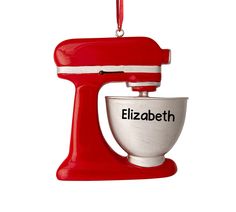 a red mixer ornament with the word elizabeth on it