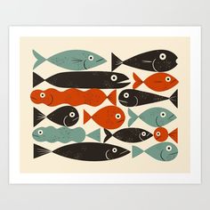 a group of fish swimming in the ocean art print by artist and photographer julia schnitzer