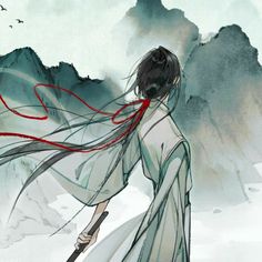 a woman with long hair holding a red string in her hand and walking through the snow