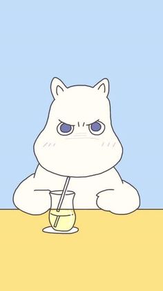 a white cat sitting at a table with a drink in front of it