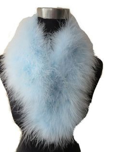 Description Commodity: Real ostrich feather fur scarf Material: Real ostrich feather  and Imitation silk cloth  Color:  Light blue Size: The Scarf long about=70cm ,          The Scarf width =14cm,; 1 inch=2.54cm.(size error 1-2 cm) Friendship reminder: 1.All of our raw material is from artificial breeding. 2.If you have any questions, please contact us by EBAY MESSAGE in time. we will try to resolve your concerns within 24 hours no matter how small.(Generally, we can reply to you in time, but so Feather Scarf, Scarf Material, Ostrich Feather, Fur Scarf, Feather Design, Party Lights, Ostrich Feathers, Peacock Blue, Raw Material