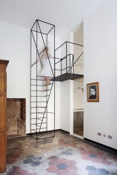 a spiral staircase in the middle of a room