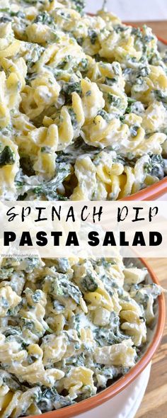 spinach dip pasta salad in an orange and white bowl with text overlay that reads spinach dip pasta