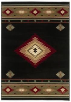 a black rug with red and beige designs