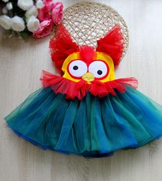 Toddler HEI HEI the Rooster INSPIRED  dress, Kids Chicken tutu costume, Baby Red Blue Yellow by Moana inspired romper, Halloween dress girl All dresses are handmade and with the high quality. We make this dress from a soft velvet, satin  and a soft tulle fabrics, with the cotton lining inside. Before order please, check your child's measurements on the size chart. Make sure the dimensions are correct. If there is no measurement in the table, you can send us your kid's measurements as a message. Cute Tulle Dress For Playtime, Cute Tutu Dress With Ruffles For Play, Whimsical Multicolor Princess Dress For Costume Party, Fun Multicolor Summer Tutu Dress, Princess Style Tutu Dress For Summer Costume Party, Whimsical Princess Dress For Summer Costume Party, Playful Blue Tutu Dress For Summer, Playful Ruffled Dress For Costume Party, Cute Red Tutu Dress For Party